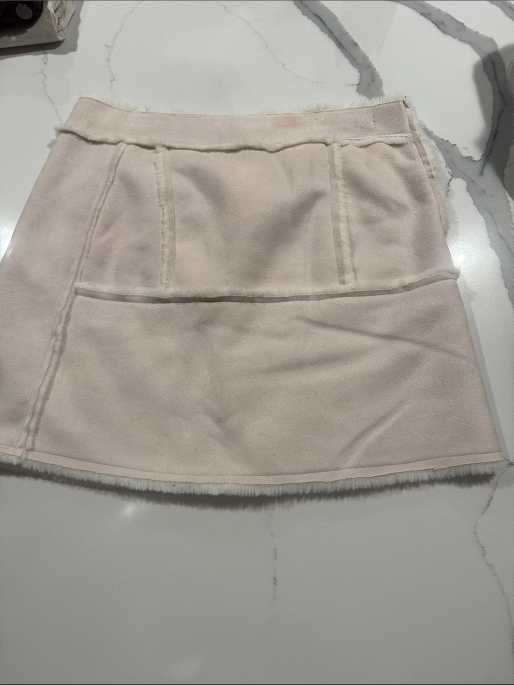 Women’s mini skirt lined with fur